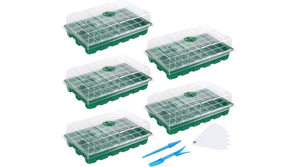 five green seedling trays