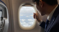 Passenger Is Partly Sucked Through Plane Window but Survives, Reports Say
